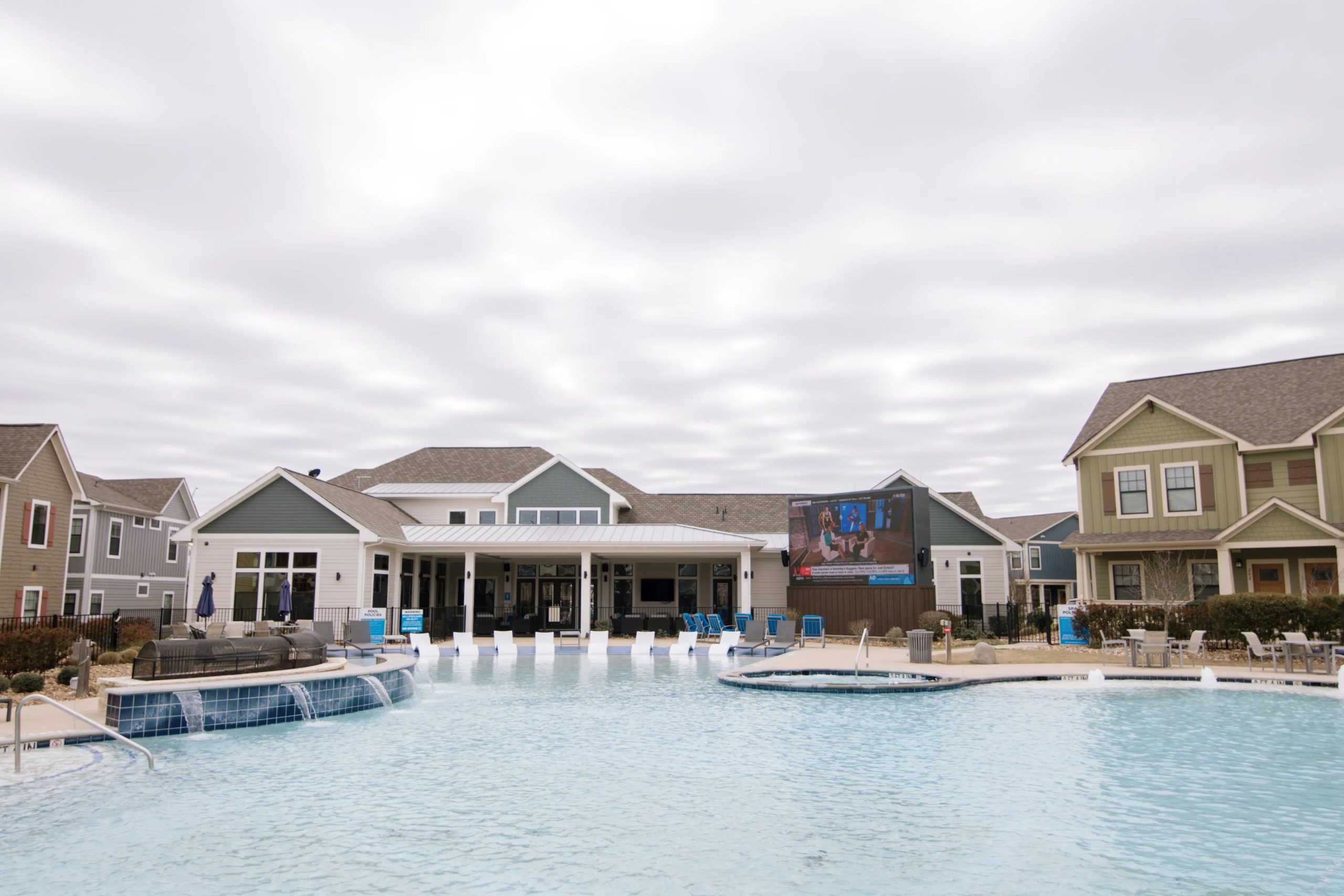 The resort-style pool deck at The Heights is the ultimate place to swim, lounge or watch the game on the jumbotron.