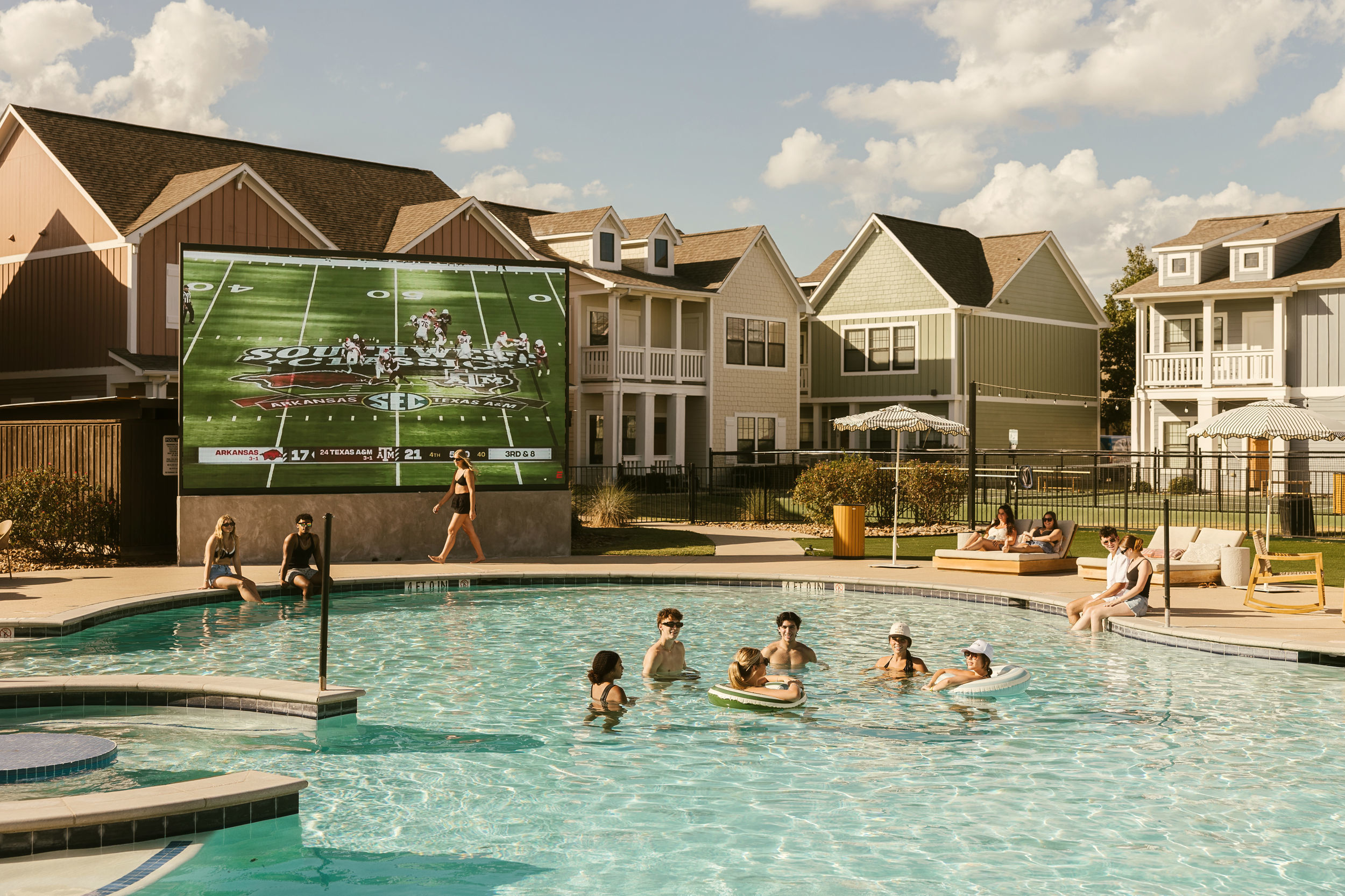 The Heights Aggie Gameday pool and jumbotron